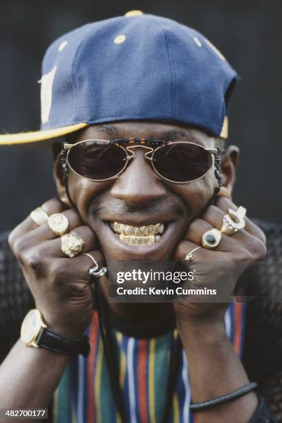 Gold Tooth Rapper Gold Tooth Photos and Premium High Res Pictures - Getty Images