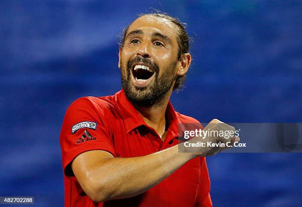 Marcos Baghdatis of Cyrpus reacts after defeating Gilles Muller of Luxembourg during the BB&T Atlanta Open at Atlantic Station on August 1, 2015 in...