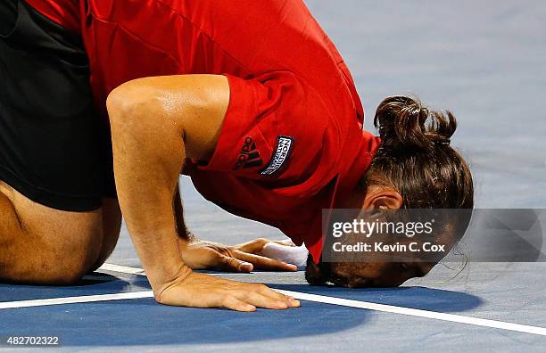 Marcos Baghdatis of Cyrpus reacts after defeating Gilles Muller of Luxembourg during the BB&T Atlanta Open at Atlantic Station on August 1, 2015 in...