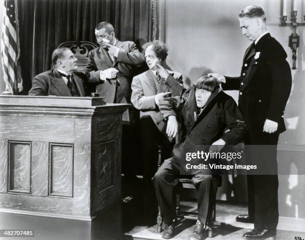 Still from a film starring The Three Stooges, Larry, Moe and Curly, circa 1935.