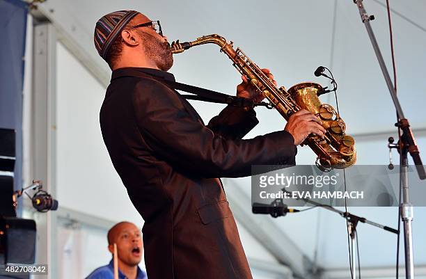 Saxophonist Kenny Garrett performs with drummer Marcus Baylor at the Newport Jazz Festival in Newport, Rhode Island, on August 1, 2015. AFP PHOTO/...