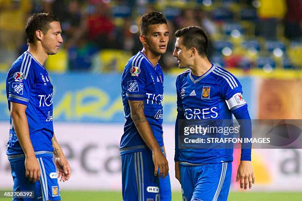 Jesus Dueñas , Luis Castillo and Jose Torres of Tigres look dejected after a 2nd round match between Morelia and Tigres UANL as part of the Apertura...
