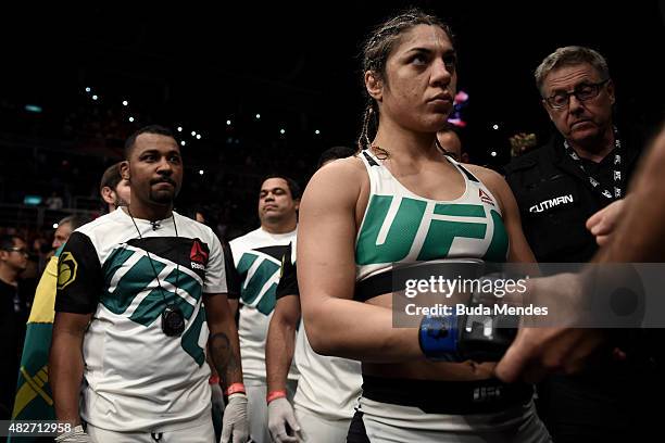 Bethe Correia of Brazil prepares to enter the octagon prior to her bantamweight title fight against Ronda Rousey of the United States during the UFC...