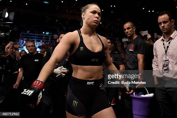 Ronda Rousey of the United States prepares to enter the octagon prior to her bantamweight title fight Bethe Correia of Brazil during the UFC 190...