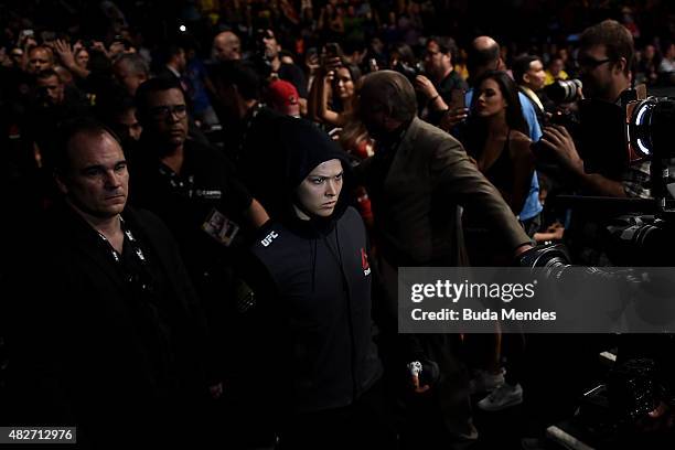 Ronda Rousey of the United States prepares to enter the octagon prior to her bantamweight title fight Bethe Correia of Brazil during the UFC 190...