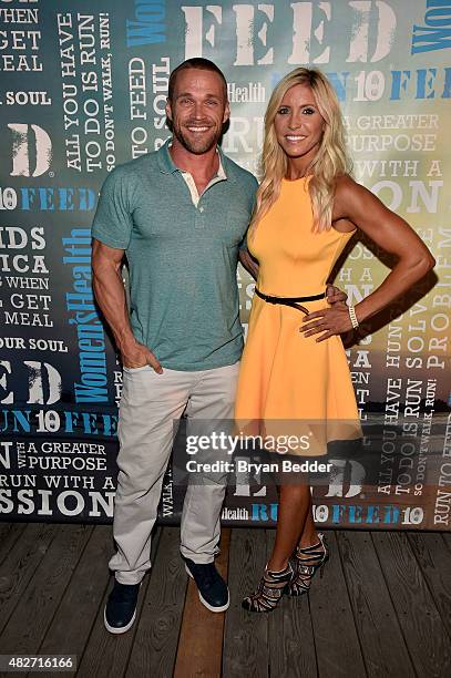 Personalities Chris Powell and Heidi Powell attend the Women's Health's 4th annual party under the stars for RUN10 FEED10 on August 1, 2015 in...