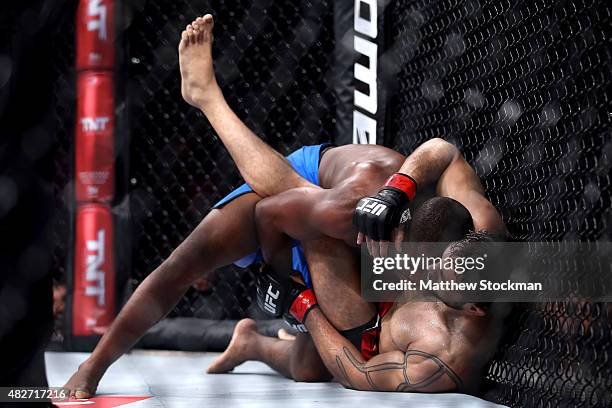 Fernando Bruno of Brazil fights Glaico Franca of Brazil in their lightweight bout during the UFC 190 Rousey v Correia at HSBC Arena on August 1, 2015...