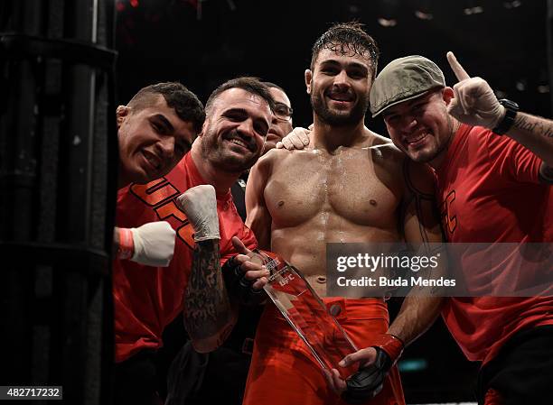 Glaico Franca of Brazil celebrates his submission victory over Fernando Bruno of Brazil in their lightweight bout during the UFC 190 Rousey v Correia...