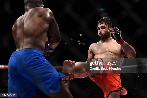 Glaico Franca of Brazil kicks Fernando Bruno of Brazil in their lightweight bout during the UFC 190 Rousey v Correia at HSBC Arena on August 1, 2015...