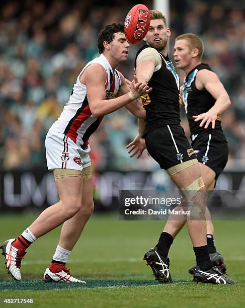 Paddy McCartin of the Saints and Jackson Trengove of the Power contest the ball during the round 18 AFL match between the Port Adelaide Power and the...