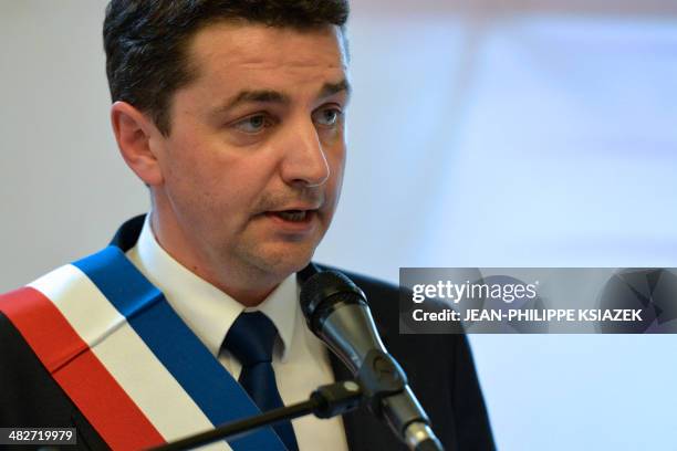 Newly elected French right-wing UMP party and centre-right UDI opposition party mayor of Saint-Etienne Gael Perdriau speaks, wearing his mayor's...