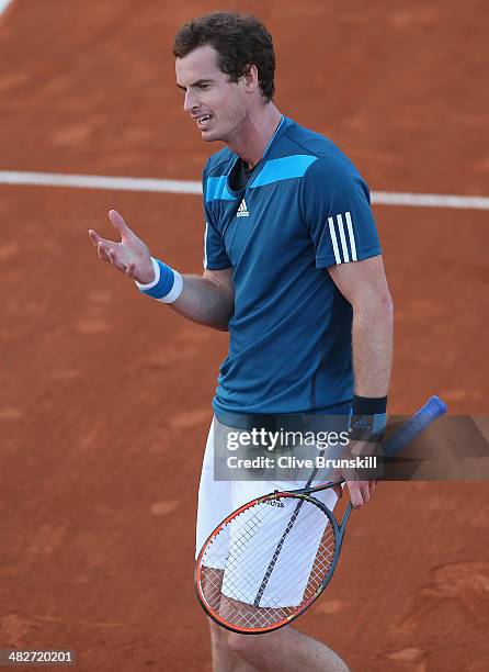 Andy Murray of Great Britain shows his frustrations against Andreas Seppi of Italy during day one of the Davis Cup World Group Quarter Final match...