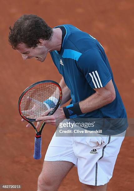 Andy Murray of Great Britain shows his frustrations against Andreas Seppi of Italy during day one of the Davis Cup World Group Quarter Final match...