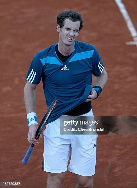 Andy Murray of Great Britain shows his frustrations against Andreas Seppi of Italy during day one of the Davis Cup World Group Quarter Final match...