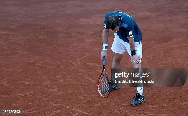 Andy Murray of Great Britain shows his frustrations against Andreas Seppi of Italy during day one of the Davis Cup World Group Quarter Final match...