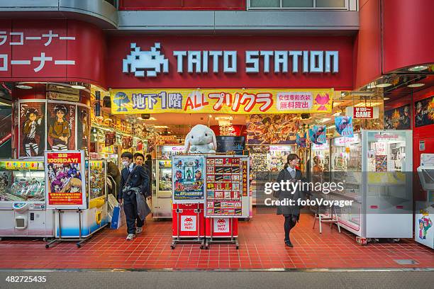 tokyo youths at games arcade in akihabara electric town tokyo - otaku stock pictures, royalty-free photos & images