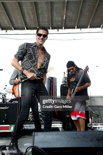 Perry Farrell and Robert Trujillo perform in concert on the Kidzapalooza stage during day 2 of Lollapalooza at Grant Park on August 1, 2015 in...