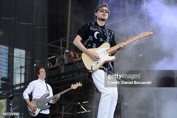 Jimmy Dixon and Vincent Neff of Django Django perform on stage during Lollapalooza 2015 at Grant Park on August 1, 2015 in Chicago, United States.