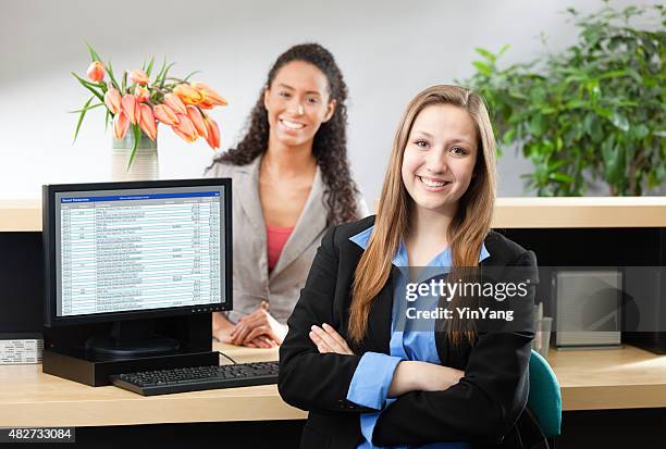 retail bank interior with teller and customer - teller stock pictures, royalty-free photos & images