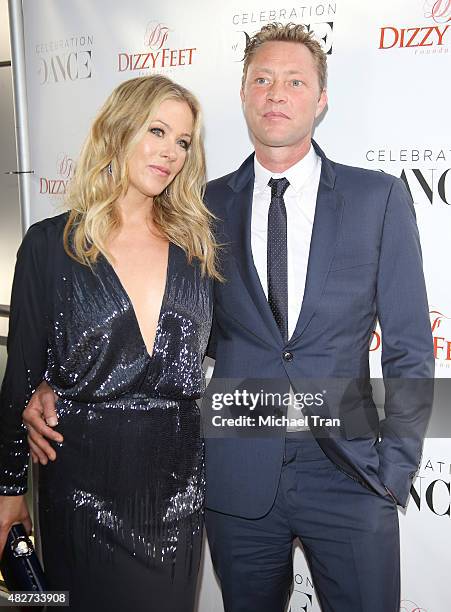 Christina Applegate and her husband, Martyn LeNoble arrive at Dizzy Feet Foundation's 5th Annual Celebration Of Dance Gala held at Club Nokia on...