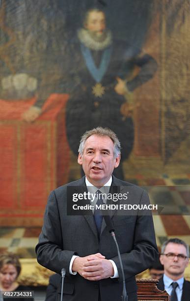 President of the French centrist Democratic Movement , and newly elected mayor of Pau, Francois Bayrou , standing in front of a portrait of French...