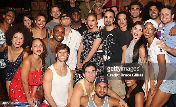 Jennifer Lopez poses with the cast backstage at the hit new musical "Hamilton" on Broadway at The Richard Rogers Theater on August 1, 2015 in New...