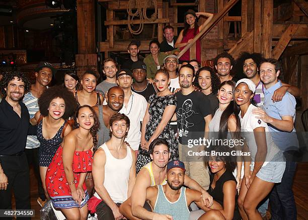 Jennifer Lopez poses with the cast backstage at the hit new musical "Hamilton" on Broadway at The Richard Rogers Theater on August 1, 2015 in New...