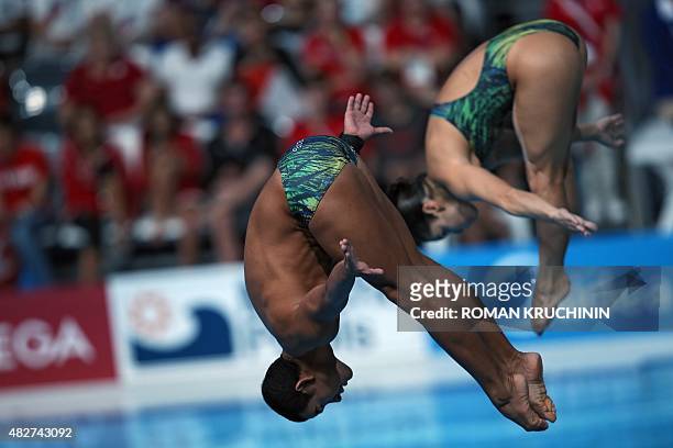 Brazil's divers Ian Matos and Juliana Veloso compete in the Mixed 3m Synchronised Springboard final diving event at the 2015 FINA World Championships...