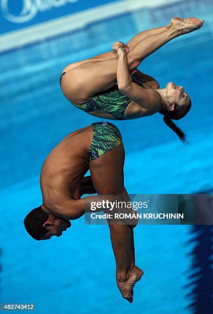 Brazil's divers Ian Matos and Juliana Veloso compete in the Mixed 3m Synchronised Springboard final diving event at the 2015 FINA World Championships...