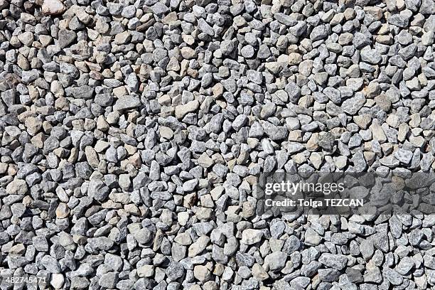 crushed rock - minirock stock pictures, royalty-free photos & images