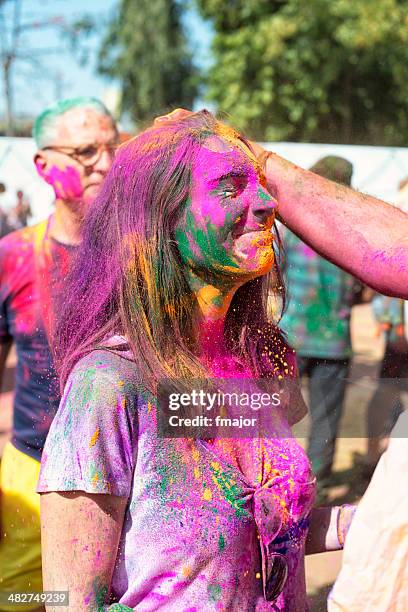 holi festival - action painting stock-fotos und bilder