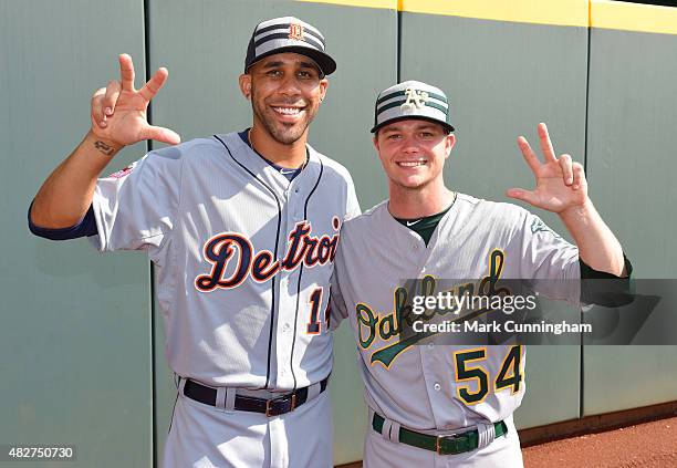 American League All-Stars David Price of the Detroit Tigers and Sonny Gray of the Oakland Athletics hold up the Vanderbilt University 'VU' hand sign...