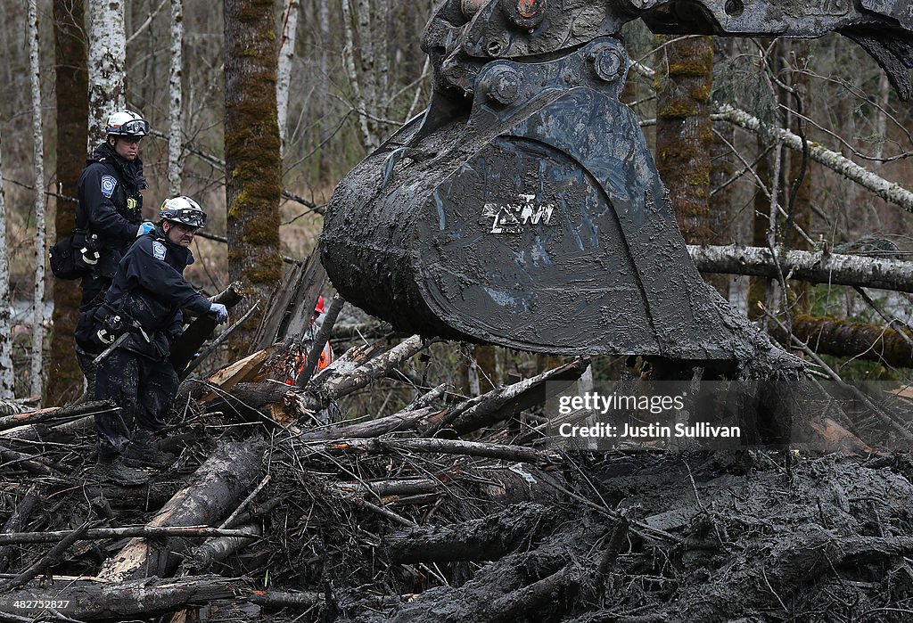 Search Efforts Continue For Mudslide Victims