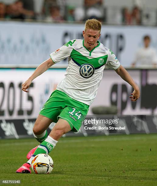Kevin De Bruyne of VfL Wolfsburg runs with the ball during the DFL Supercup 2015 match between VfL Wolfsburg and FC Bayern Muenchen at Volkswagen...
