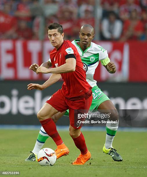 Robert Lewandowski of FC Bayern Muenchen runs with the ball during the DFL Supercup 2015 match between VfL Wolfsburg and FC Bayern Muenchen at...