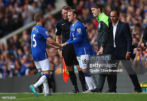 Wayne Rooney of Everton and Manchester United about to run on to the pitch as he replaces Tom Cleverley of Everton during the Duncan Ferguson...
