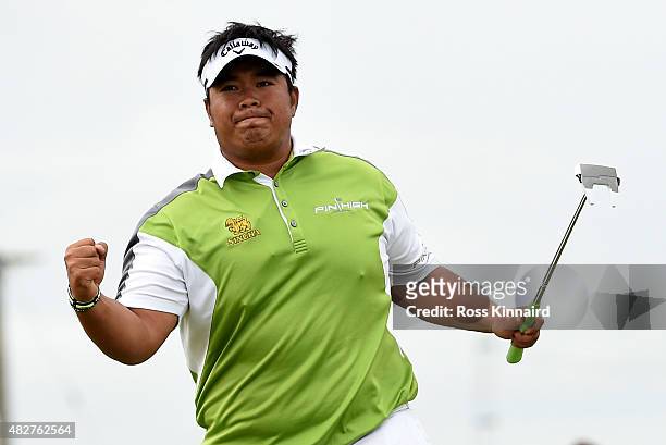 Kiradech Aphibarnrat of Thailand celebrates winning his match against Robert Karlsson of Sweden in the final of the Saltire Energy Paul Lawrie...