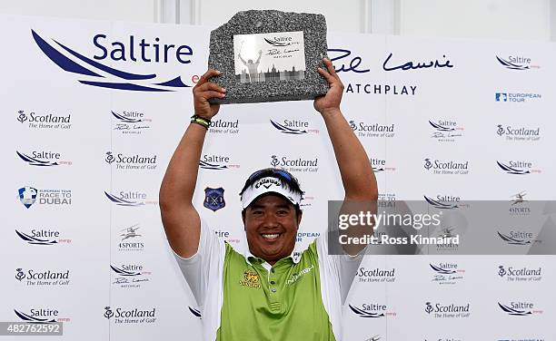 Kiradech Aphibarnrat of Thailand celebrates winning his match against Robert Karlsson of Sweden in the final of the Saltire Energy Paul Lawrie...