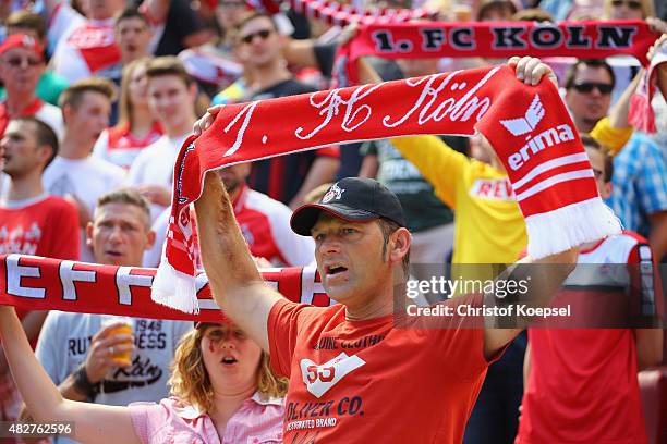 The fans of Koeln celebrate during the Colonia Cup 2015 match between 1. FC Koeln and FC Valencia at RheinEnergieStadion on August 2, 2015 in...