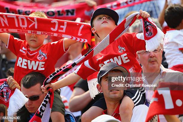 The fans of Koeln celebrate during the Colonia Cup 2015 match between 1. FC Koeln and FC Valencia at RheinEnergieStadion on August 2, 2015 in...