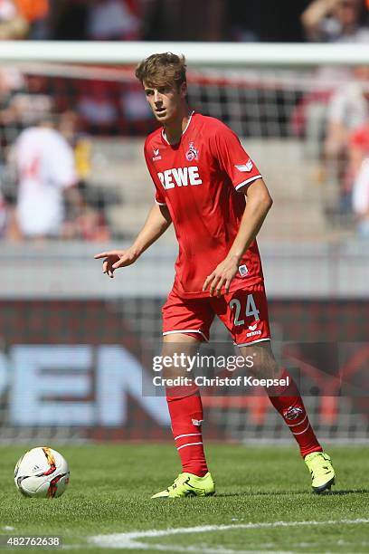 Lukas Kluenter of Koeln runs with the ball during the Colonia Cup 2015 match between 1. FC Koeln and FC Valencia at RheinEnergieStadion on August 2,...