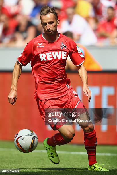 Dusan Svento of Koeln runs with the ball during the Colonia Cup 2015 match between 1. FC Koeln and FC Valencia at RheinEnergieStadion on August 2,...