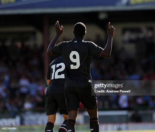 Christian Benteke of Liverpool scores the opening goal during a preseason friendly at County Ground on August 2, 2015 in Swindon, England.