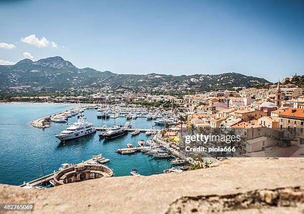 the village and touristic harbor of calvi, corsica - corsica stock pictures, royalty-free photos & images