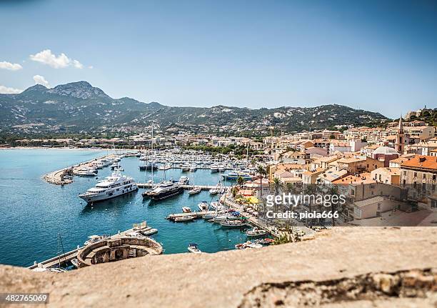 the village and touristic harbor of calvi, corsica - corsica 個照片及圖片檔