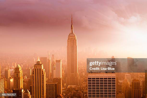 nyc skyline at sunset - purple sunset stock pictures, royalty-free photos & images