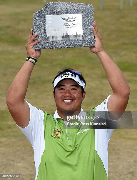 Aphibarnrat of Thailand with the winners trophy after his match against Robert Karlsson of Sweden in the final of the Saltire Energy Paul Lawrie...