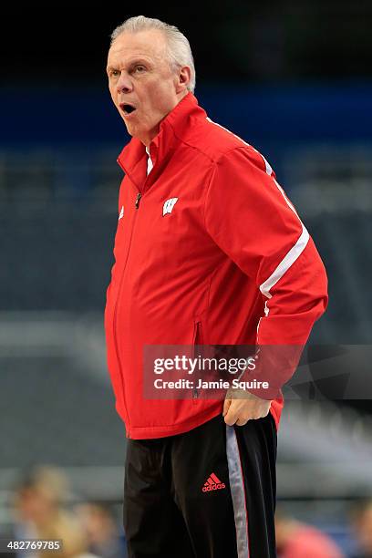 Head coach Bo Ryan of the Wisconsin Badgers on the court as the Badgers practice ahead of the 2014 NCAA Men's Final Four at AT&T Stadium on April 4,...