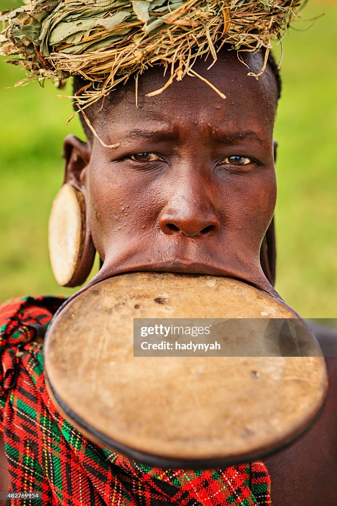 Portrait of woman from Mursi tribe, Ethiopia, Africa