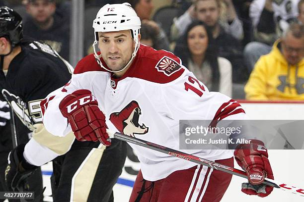 Paul Bissonnette of the Phoenix Coyotes skates against the Pittsburgh Penguins during the game at Consol Energy Center on March 25, 2014 in...